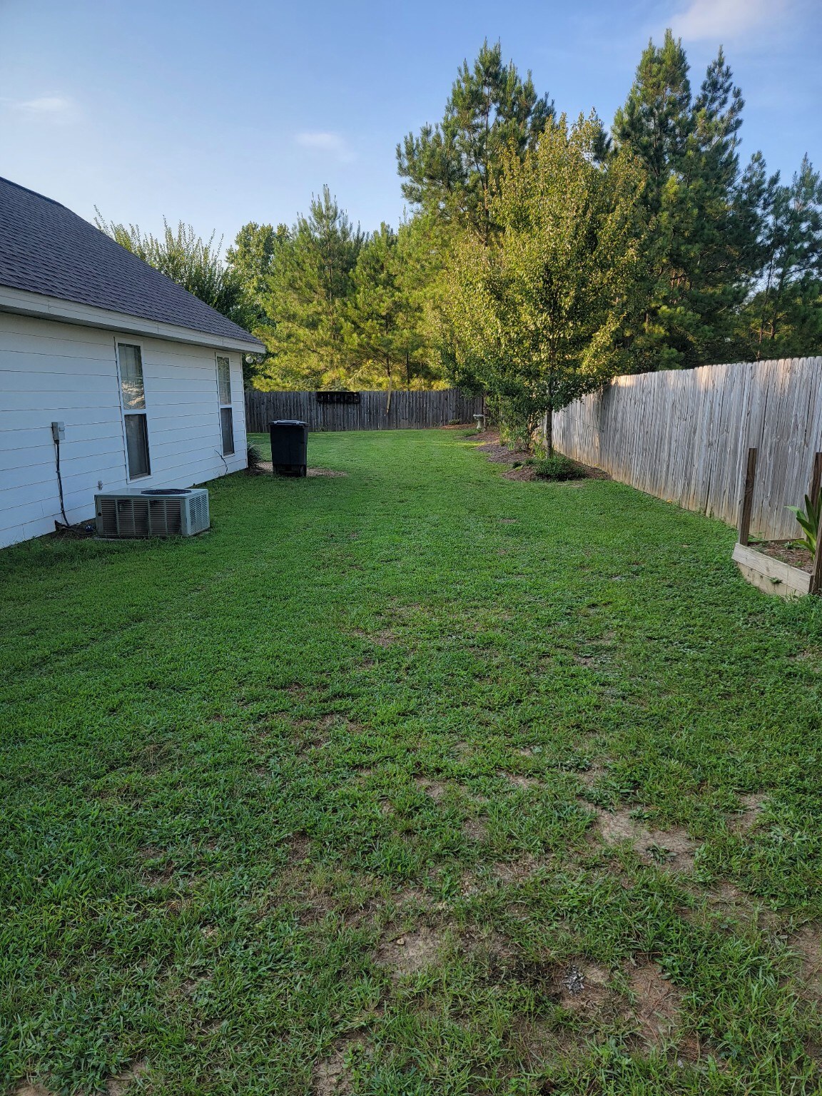 Second view of fenced backyard